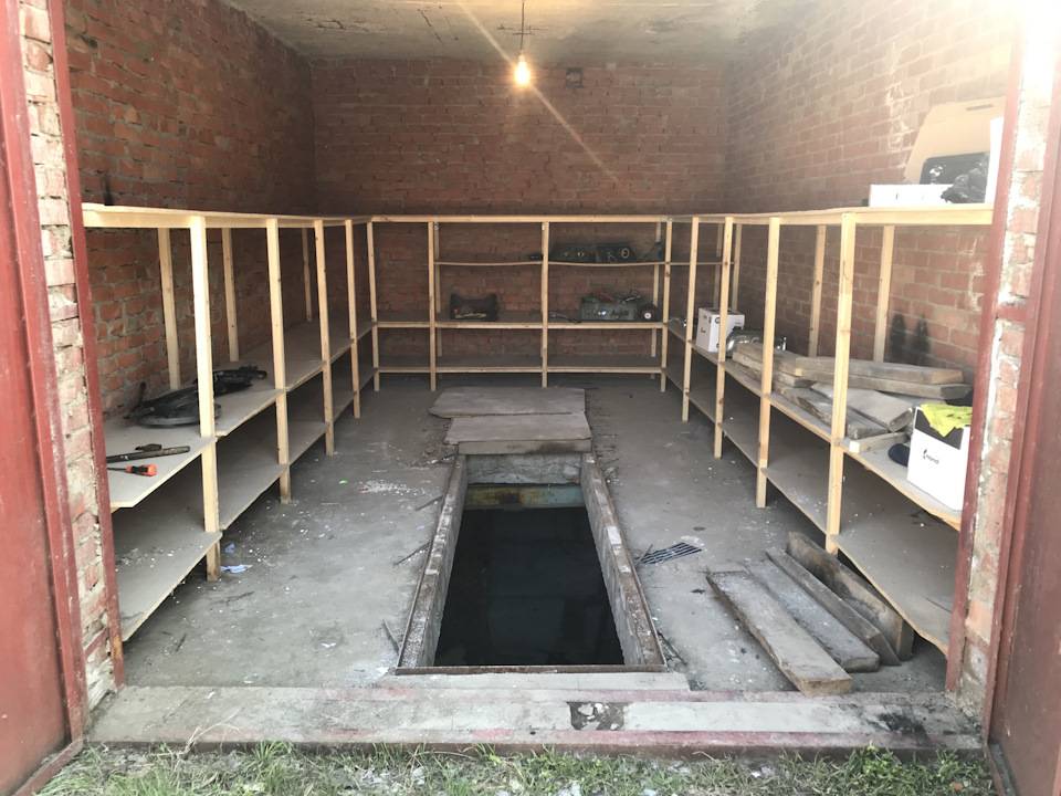 Погреб в гараже: строительство котлована, устройство пола, стен и потолочного перекрытия, гидроизоляция и внутренняя отделка